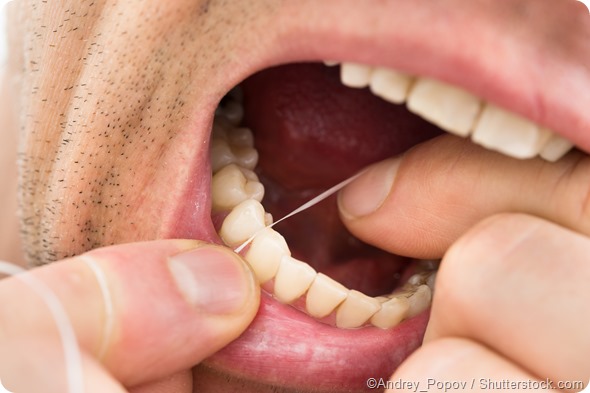 Man flossing